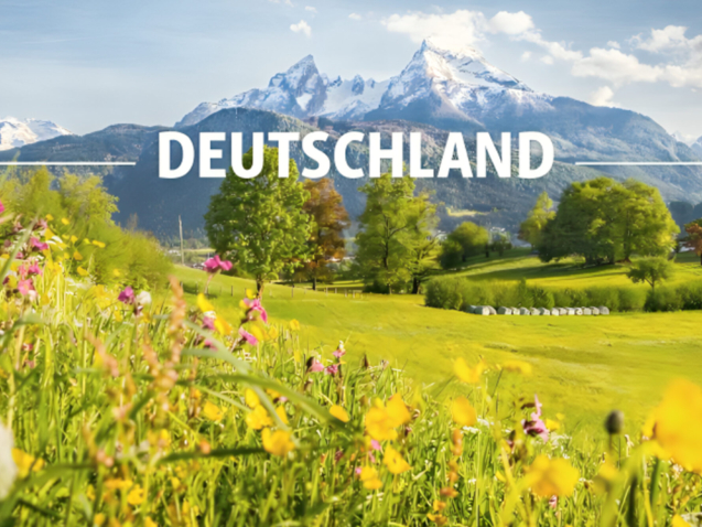 The Frankfurt city surrounded by buildings under a cloudy sky during a golden sunset in Germany
