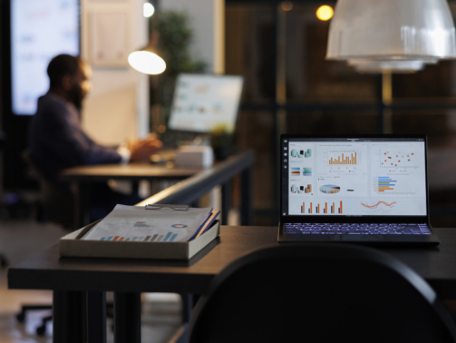 The Frankfurt city surrounded by buildings under a cloudy sky during a golden sunset in Germany